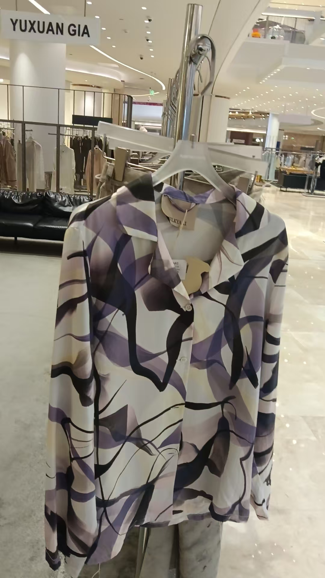 Classic purple fleur-de-lis print top