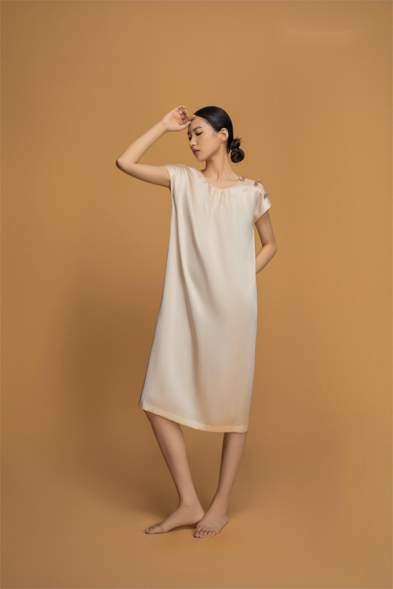 Elegant sleeveless skirt in pink and white