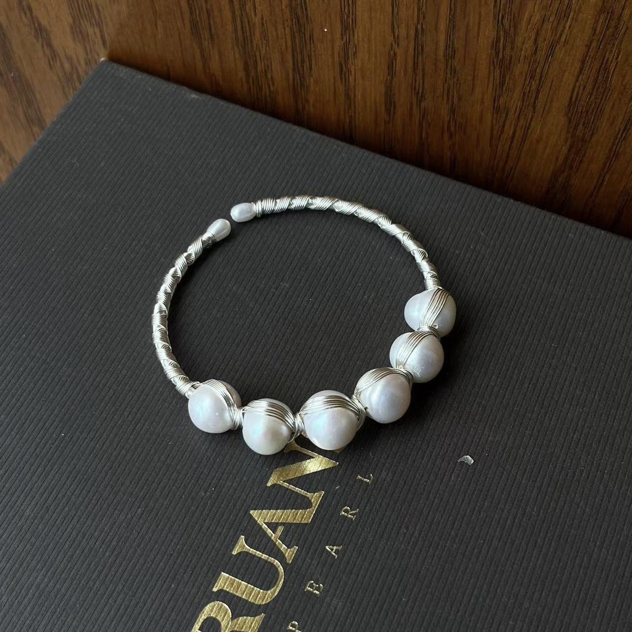 Ground round American gold and silver bracelet