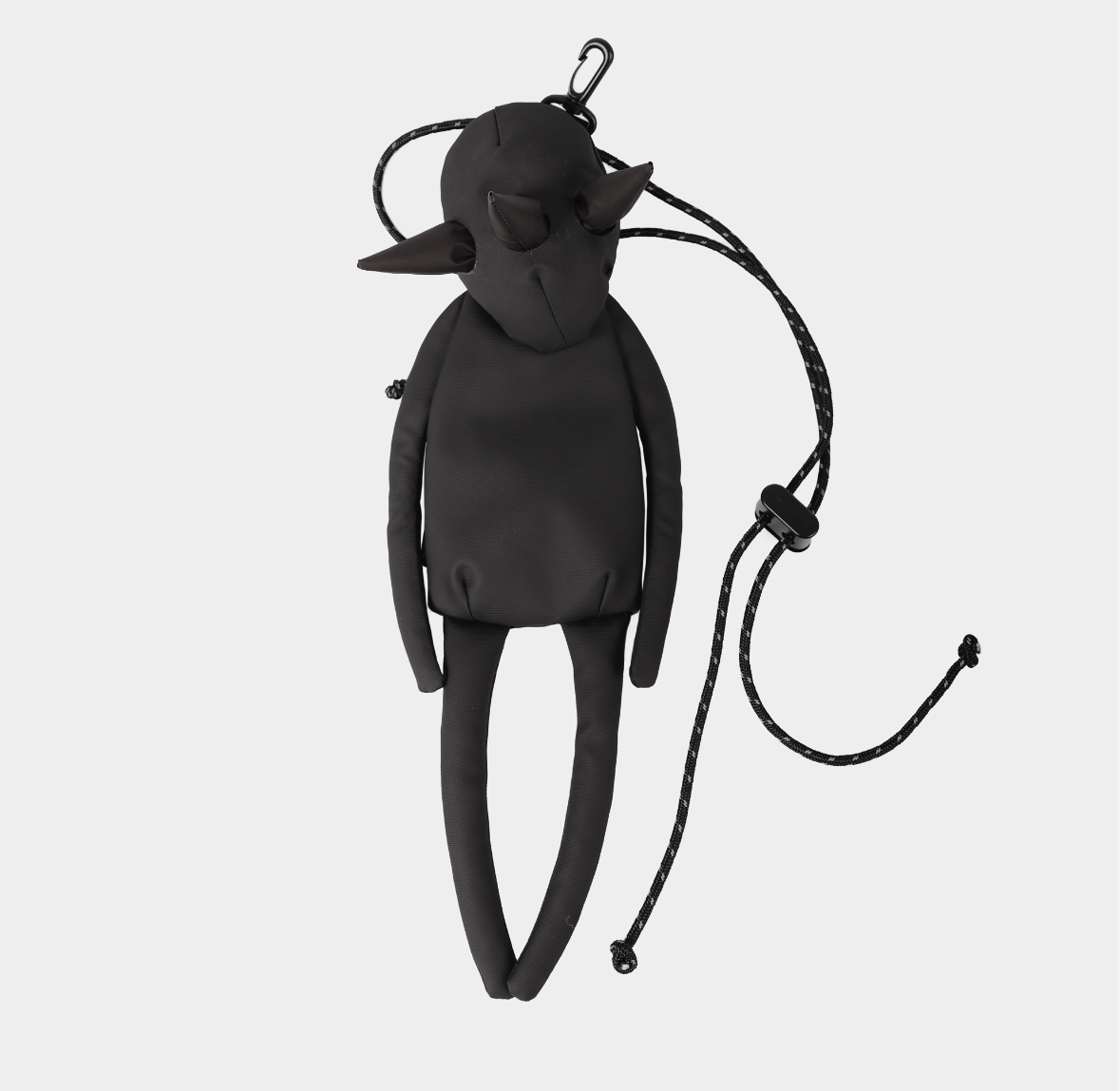 Black discolored little alien with cone eyes